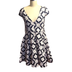 A line fit and flare Mink Pink dress size M